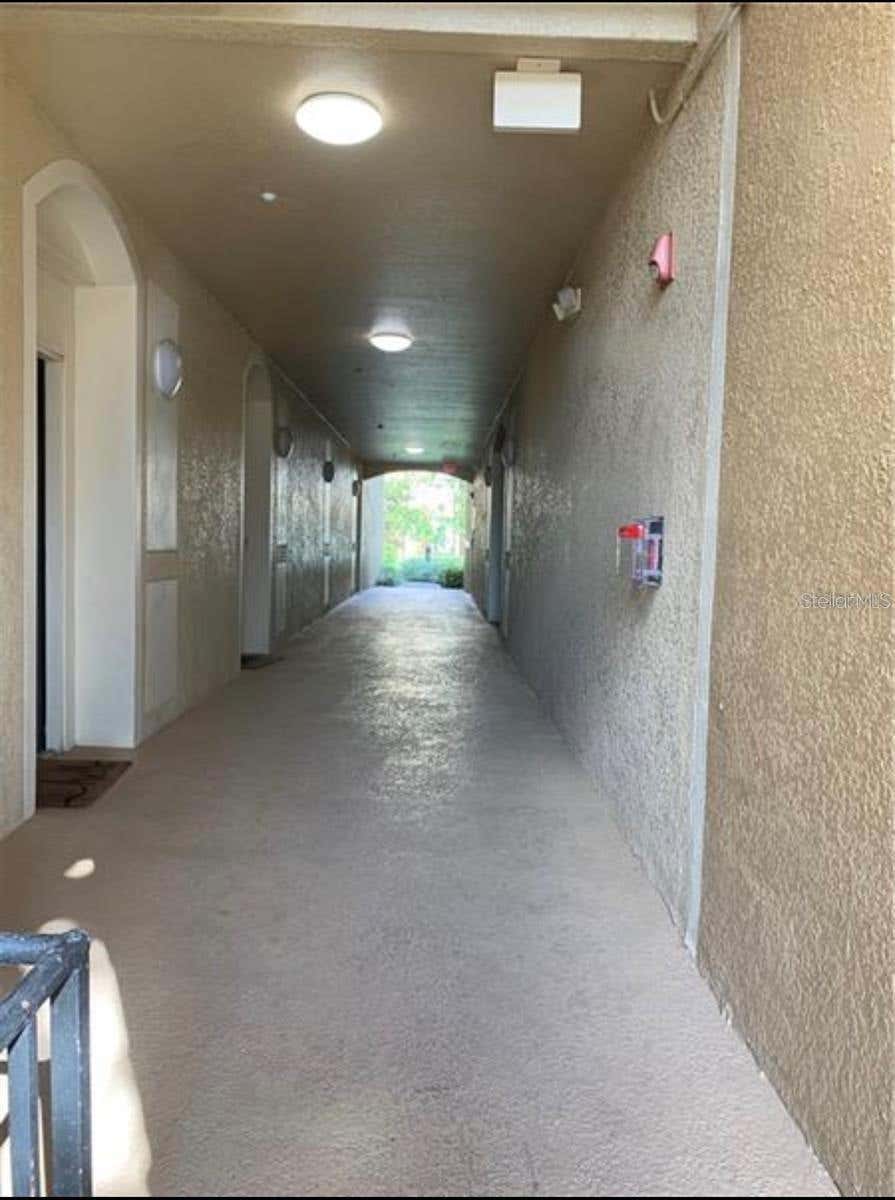 Photo of 6466 Cava Alta Drive #104, Orlando, FL 32835 (MLS # O6415898)