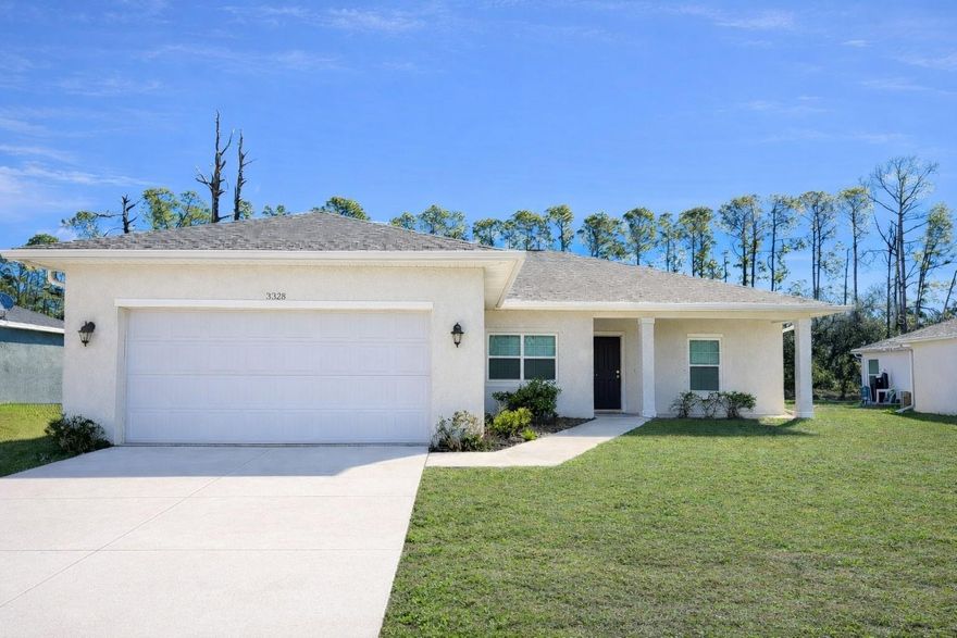 Welcome to this beautiful 3-bedroom, 2-bath home with 1,548 square feet, built in 2020 and designed for comfortable modern living. This home features a spacious open floor plan with luxury vinyl flooring throughout the main living areas and carpet in the bedrooms, creating a perfect blend of style and comfort. The kitchen is well-appointed with recessed lighting, stainless steel appliances, granite countertops, a pantry, and an island with barstool seating overlooking both the living room and separate dining area — ideal for entertaining and everyday living. Sliding glass doors lead to a covered lanai where you can relax and enjoy serene wooded views. The primary bedroom is generously sized and includes a walk-in closet and an ensuite bathroom featuring a tiled walk-in shower, granite countertop, and dual vanity sinks. The secondary bedrooms are also spacious and provide flexibility for guests, family, or a home office. Not located in a flood zone and with no HOA dues or CDD fees, this home offers both peace of mind and affordability. Schedule your private tour today and make this beautiful home yours.