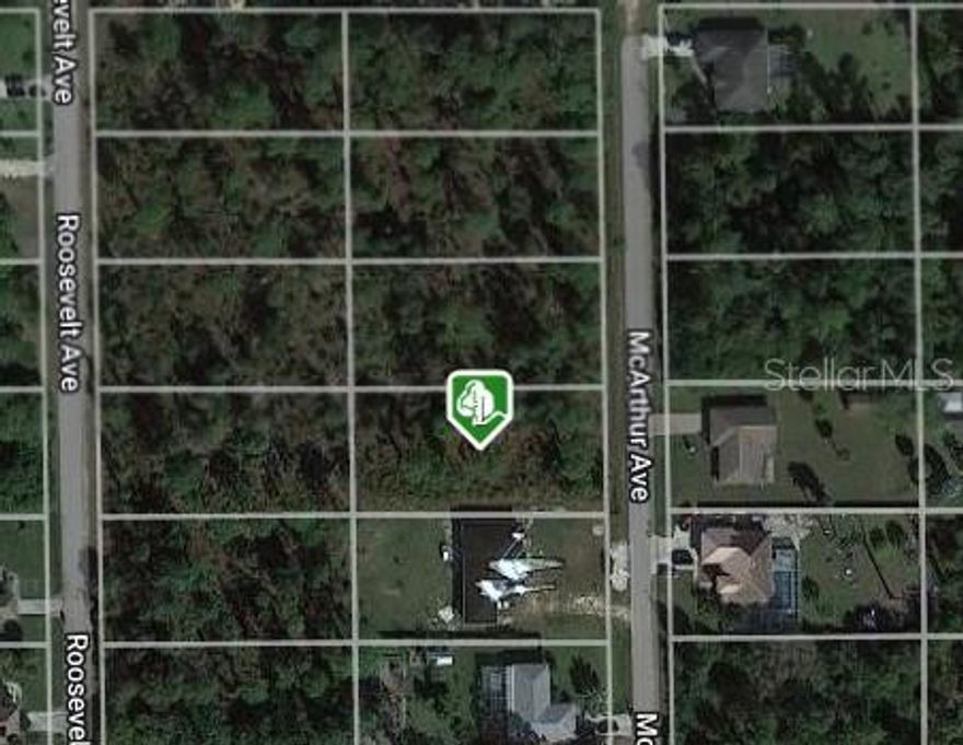 This Half Acre property is perfect to build your next home on. Plenty of room for all your toys and a pool. Lehigh Acres is a great location close to shopping, beaches the Fort Myers airport as well as Sanibel Island and an easy drive to down town Fort Myers. This home is centrally located less than 2 hours from Miami and Tampa and a few hours drive to Orlando and Jacksonville. Property is off a paved road and ready to go.