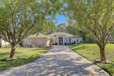 Photo of 12054 Quail Ridge Drive, Spring Hill, FL 34610 (MLS # TB8518409)