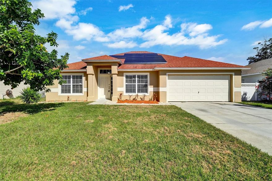 This Home with Its Large Fenced Yard "Feels Like HOME". This very spacious home has been painted inside and out. Brand New Engineered Waterproof Laminate Flooring throughout, Updating Lighting, New Granite Countertops, Stainless Steel Appliances in Kitchen, Bathroom has New Vanities with Granite countertops.  The Master bedroom is very large with a spacious walk-in closet and Large master bathroom with New Toilet, and Double Sinks and separate toilet area. There are Ceiling Fans in All Bedrooms.  The Home has a Split Bedroom Plan, with a Large Open Family Room in the Center. There is a water filtration system with Water Softener, The Monthly HOA Fees includes Internet, Phone and Online TV. The Home's SOLAR PANELS will keep your energy bills LOW.