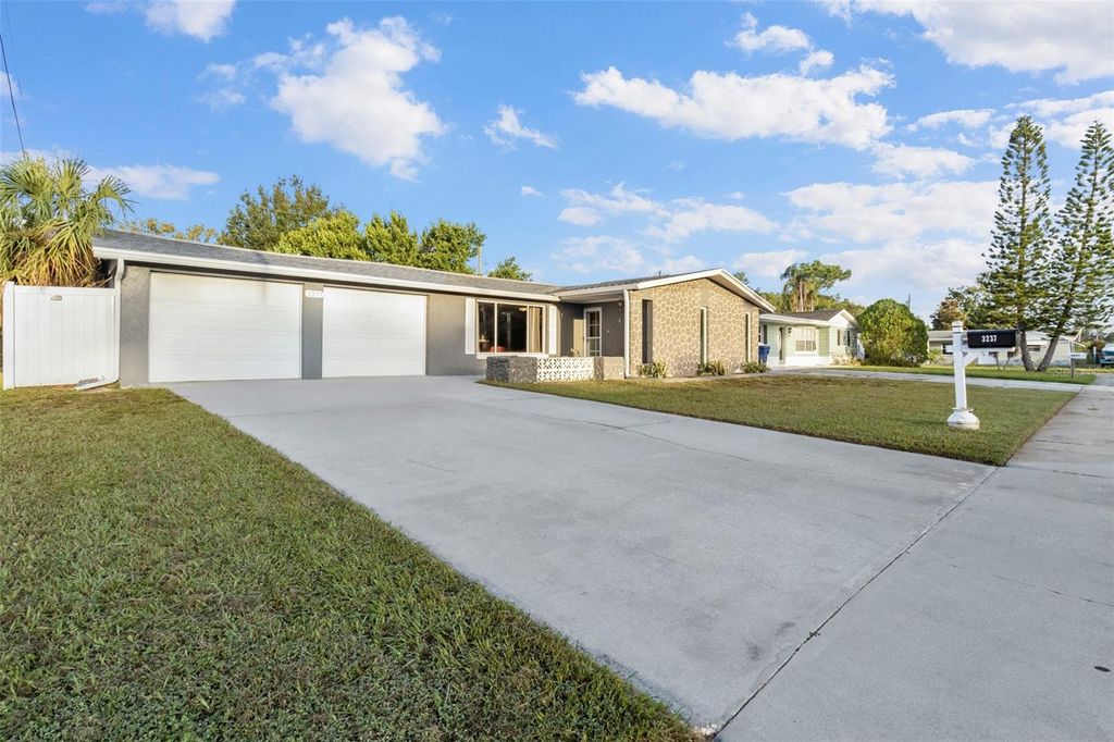 Photo of 3237 Sanford Drive, Holiday, FL 34691 (MLS # TB8413387)