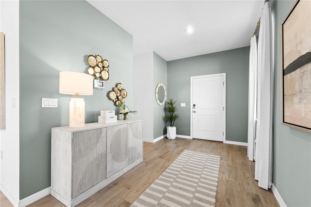 Photo of 1672 Meadowgrove Avenue NE, Saint Cloud, FL 34771 (MLS # O6444813)
