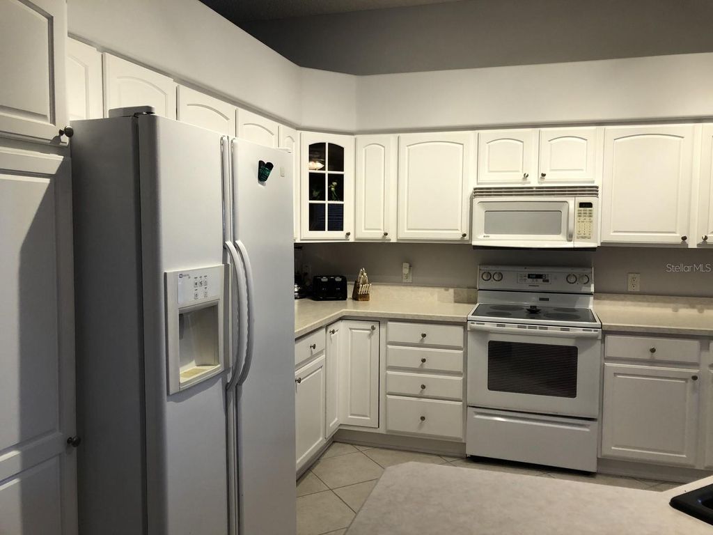 Photo of 119 Costa Mesa Drive, Lady Lake, FL 32159 (MLS # OM705111)