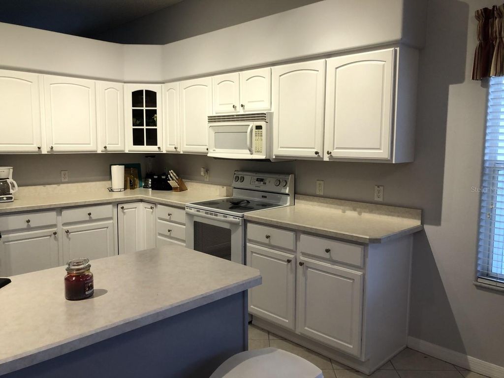 Photo of 119 Costa Mesa Drive, Lady Lake, FL 32159 (MLS # OM705111)