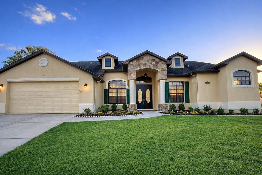 One or more photo(s) has been virtually staged. Welcome to this impressive 3-bedroom home in the heart of Spring Hill, featuring a grand entrance with elegant Roman-style columns that create timeless curb appeal and a striking first impression. The foyer welcomes you with additional Roman-style columns that add architectural character and sophistication, while the formal dining room is beautifully accented with matching Roman-style columns, creating an elegant space perfect for hosting gatherings. Inside, you’ll find a spacious 19x18 living room ideal for entertaining, a dedicated office, and a separate casual dining area for everyday meals. The well-appointed kitchen offers ample counter space and flows seamlessly into the main living areas. The primary suite measures a generous 17x12, providing a comfortable retreat, while the additional bedrooms have flexibility for family or guests. A 2-car garage provides added convenience and storage, and the prime location places you just minutes from major shopping, dining, and outdoor attractions, including Weeki Wachee State Park. This home blends architectural elegance with functional living in one of Spring Hill’s most desirable locations. Call today for a viewing of this beautiful home.