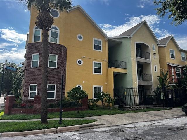 Experience the charm of THE QUARTER AT YBOR —
Maintenance-free living at its finest in the heart of Old Ybor — Tampa’s Historic Latin Quarter and a designated National Historic Landmark District.
This 3rd-floor condo features two bedrooms, two bathrooms, and two dedicated, gated, covered parking spaces. Thoughtful upgrades include new blinds, fully updated bathrooms, modern lighting fixtures throughout, a ceiling fan on the patio overlooking the pool, updated entry flooring, kitchen tile, and carpet, plus custom California Closets in the primary bedroom with soft-close drawers and backing.
The laundry/storage room includes a washer and dryer, custom-built cabinetry, additional storage, and a tack wall by California Closets. Inside, you’ll find a spacious floorplan, a newer water heater (2018), and an upgraded HVAC condenser.
Residents enjoy access to two resort-style swimming pools, a private movie theater, a game room with a full kitchen, and a fitness center — all within a secure, gated community. Ideally located near Downtown Tampa, I-4, and I-75, and just a short walk to Ybor City’s vibrant 7th Avenue Entertainment District.
