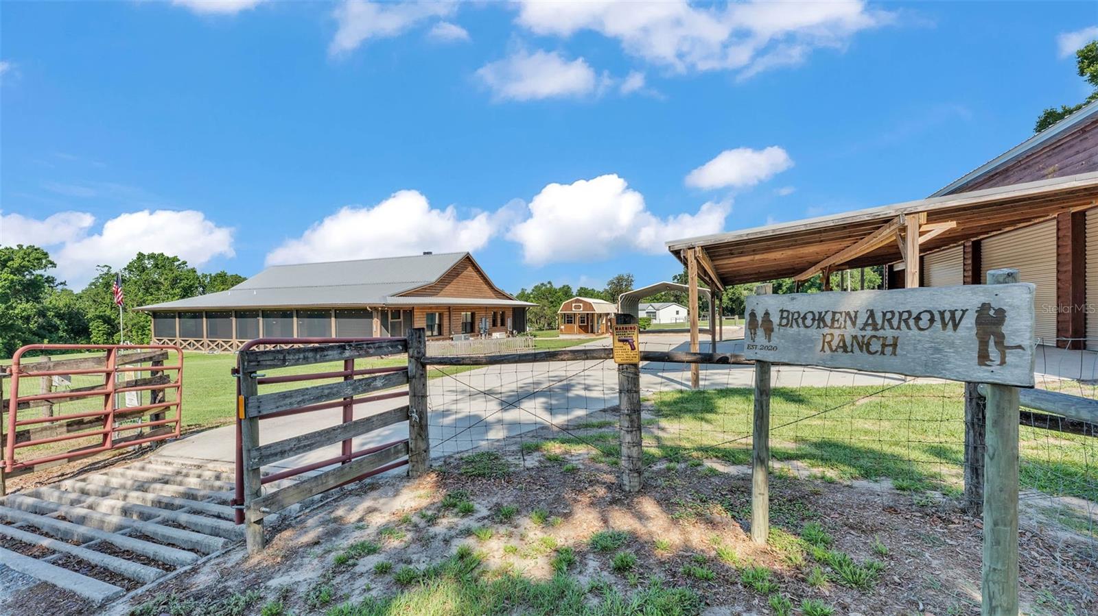 Bring your family, toys and animals! Your opportunity to own a slice of paradise is here. Have you ever wanted a homestead? Do you ever dream of growing your own food? With 40 plus acres of land the possibilities are limitless. Theres a spring fed pond on the property. This property offers not one but THREE homes!
The primary home has a ranch style fitted with luxury touches. It offers 3 bedrooms, 2 bathrooms, a large open floor plan, wood floors, stone countertops, fireplace inside and outside, large screened porches on the front and the rear, central vacuum to make cleaning up a breeze, high ceilings, freshly painted, large laundry room, extra storage room fitted with a dog washing station, tankless water heater, A/C Purifier, his/hers closets and sinks, large walk-in stone shower and free standing tub for soaking. Did I mention it also has a whole home generator that runs from propane tanks holding up to 700 gallons of gas to make sure you never run out of power next hurricane season. In ground saltwater pool/spa with state-of-the-art lighting system newly installed.
The secondary home has a charming farmhouse feel and also offers an open floorplan with a large kitchen and island offering plenty of space for entertaining and eating, vinyl flooring, butler's pantry, inside laundry room, 3 bedrooms, 2 bathrooms, his and her sinks, large walk stone shower and a free-standing soaking tub, and front and rear porches.
The third home is a single wide mobile home and offers 3 bedrooms, 2 bathrooms and was recently updated. As if all of this wasn't enough there are multiple barns, sheds, carports, fuel tanks and she shed and much more! Check out the photos to see it all! An additional 17.57 acres is available for purchase as well. Call for more details.