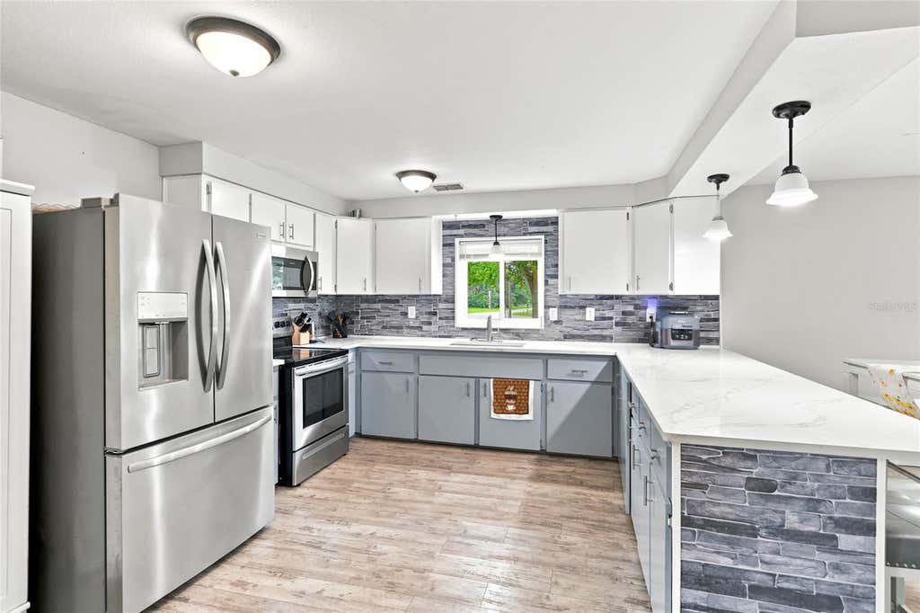 Photo of 1518 Dickens Road, Lake Wales, FL 33898 (MLS # O6419895)