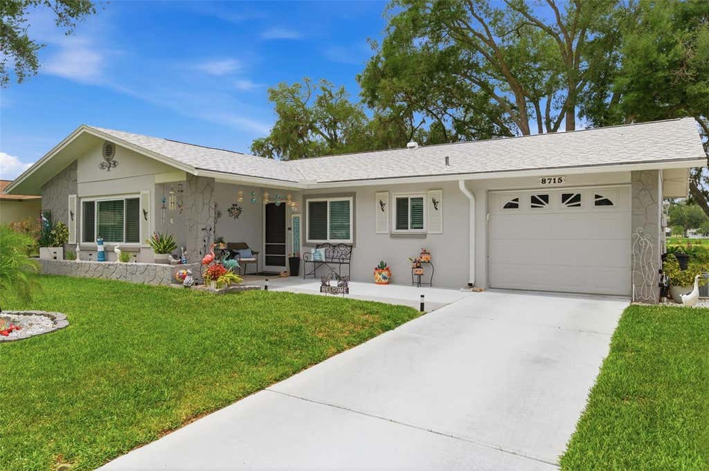 Photo of 8715 Benton Drive, Port Richey, FL 34668 (MLS # TB8515172)