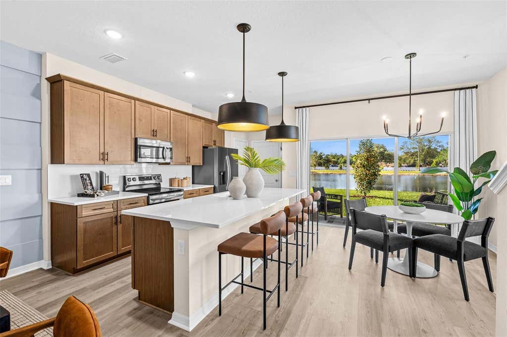 Photo of 4947 Winding River Road, Orlando, FL 32822 (MLS # W7887282)