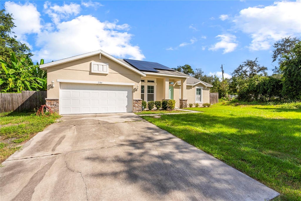 Photo of 2384 Doyle Road, Deltona, FL 32738 (MLS # O6441008)