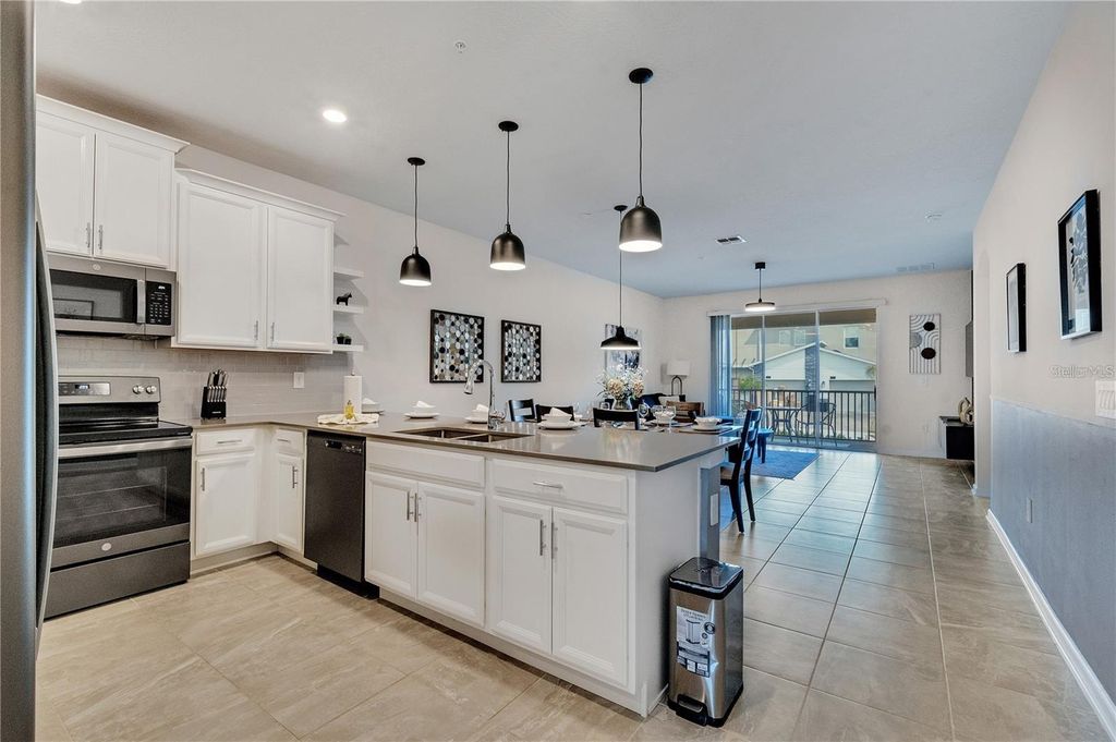 Photo of 8889 Cabot Cliffs Drive #104, Davenport, FL 33896 (MLS # S5135902)