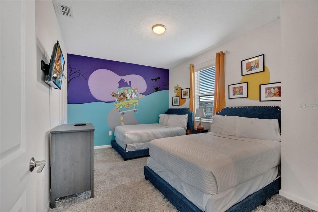 Photo of 8889 Cabot Cliffs Drive #104, Davenport, FL 33896 (MLS # S5135902)