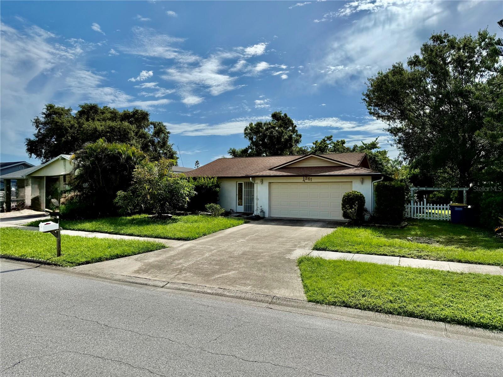 Solid single family block home. Perfectly situated , close to Tampa Int Airport, Downtown Safety Harbor, just a short drive to Downtown St. Petersburg and Clearwater beach. Enjoy concerts at Ruth Eckerd hall, as well as great shopping and fine restaurants, all of which are nearby. The home offers 3 bedrooms and 2 full baths. The homes design and layout provide a both formal Living and dining rooms, and they are just perfect for entertaining. The spacious eat in kitchen and family room, go very well together. The center hall allows access to all 3 bedrooms (including the master en suite) and the second bath. You will quickly Embrace the florida room, perfect for reading a book, or listening to your favorite music . The Florida room leads out to the large screened porch, back open patio and large rear yard. This corner property is spacious, just over a quarter acre, it has several fruit trees surrounding the open patio.