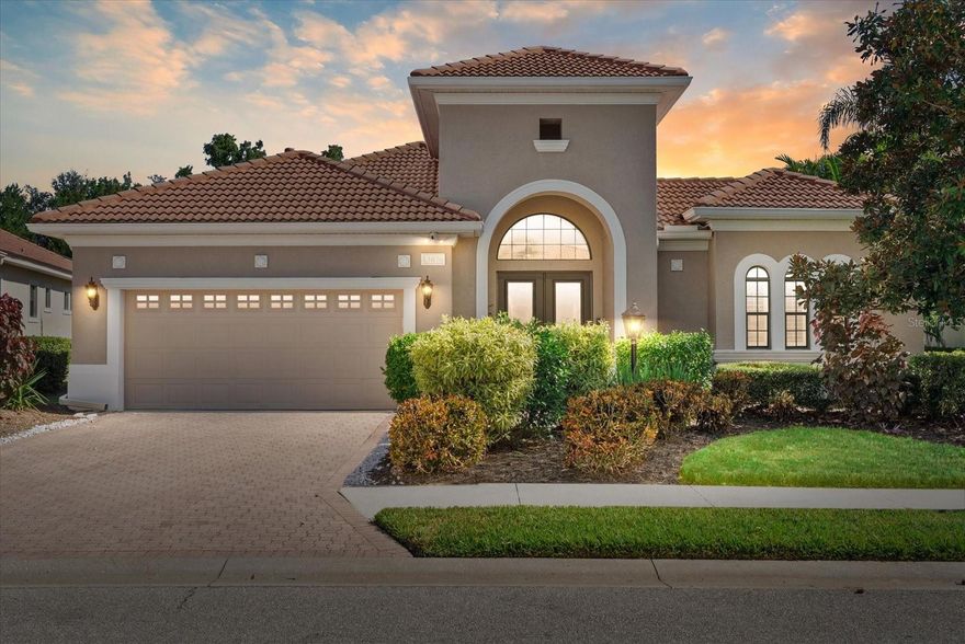 One or more photo(s) has been virtually staged. Why settle for an ordinary floorplan when you can enjoy the beauty of a true COURT-YARD style home... where every room offers a view of your own private tropical retreat? This MAINTENANCE-FREE home, located in the highly sought after gated community of Lakewood Ranch Country Club, is one of only three courtyard floorplans in the neighborhood, offering a rare blend of PRIVACY and CHARM.

Step through the French glass front doors and be immediately captivated by the secluded outdoor courtyard with pool, spa, and lanai, framed by a newly refurbished pool cage. This outdoor oasis is completely private, making it the perfect setting for both tranquil relaxation and upscale entertaining.

To the right of the COURTYARD lies a detached in-law suite (CASITA), a versatile space ideal for extended stay guests, a private home office, or multigenerational living. With its own dedicated entrance, this retreat ensures comfort and independence while still being part of the main residence.

The home backs up to a pond, providing peaceful water views and daily encounters with nature. Inside, soaring 12’ ceilings, tray ceilings, plantation shutters, and French doors create a light-filled and inviting atmosphere.

The gourmet kitchen is equipped with granite countertops, Bosch appliances, a gas cooktop with grill, and crisp cabinetry. It opens to a spacious great room, while a charming breakfast nook with an aquarium window looks out onto the sparkling pool.

Convenience is built in with dual laundry options (inside and in the garage - perfect for guests). Other thoughtful upgrades include: interior & exterior paint (2020), water softener (2021), water heater (2021), new toilets and faucets (2021), refrigerator (2022), and a new CASITA A/C (2024).

Residents have the OPTION to join the Lakewood Ranch Country Club. Whether you choose a golf membership, sports membership, or social membership, the possibilities for leisure and recreation are endless.

With a low HOA fee and a prime location near I-75, UTC shopping, Waterside restaurants, airports, and world-class Gulf beaches, this is a rare chance to own a one-of-a-kind COURTYARD home in the heart of Lakewood Ranch.