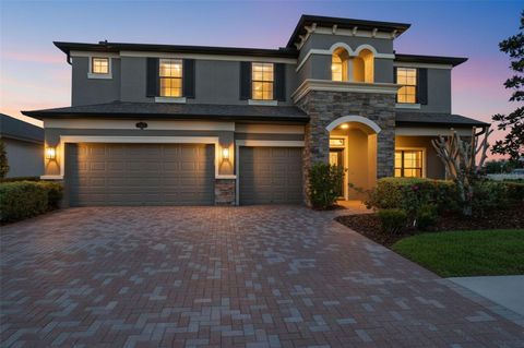 Photo of 1897 Fox Grape Loop, Lutz, FL 33558 (MLS # TB8490895)