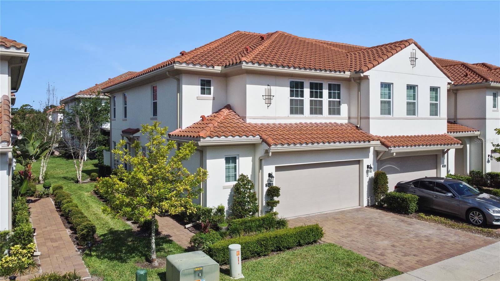 Located in the highly sought-after gated golf course community of The Reserve at Sweetwater Country Club, with access to an 18-hole 72-par Golf course, and directly across from the beautiful Wekiva Springs State Park. This beautiful end-unit townhome has gorgeous views both inside and out. The gourmet kitchen is a dream come true with quartz countertops, 42" designer cabinets, decorative backsplash, over-sized center island, Whirlpool appliances, Moen fixtures, a great walk-in pantry, and more. The home boasts 3 large bedrooms, 2.5 baths and an open great room floorplan downstairs that is perfect for entertaining. Features include 9.5' ceilings, dark wood vinyl floors on 1st floor, 8' doors, 5.25" baseboards, and carpeting upstairs. The master retreat has a large walk-in closet, with dual vanities and quartz counters in the bath and a huge walk-in frameless glass shower with two shower heads - including a rain shower. The laundry room is conveniently located upstairs with the bedrooms. The secondary bedrooms share a spacious jack-and-jill bathroom. The home is only 4-years old with great energy features such as R-30 insulation, Double Pane Low-E Vinyl Windows, LED lights and water saving fixtures. Rain gutters, a 2-car garage and paver driveway round out this beautiful luxury townhome in Sweetwater Country Club. Homes in this community sell fast! Don't miss your opportunity.