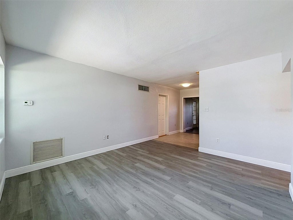 Photo of 953 Cedarwood Avenue, Dunedin, FL 34698 (MLS # W7890021)