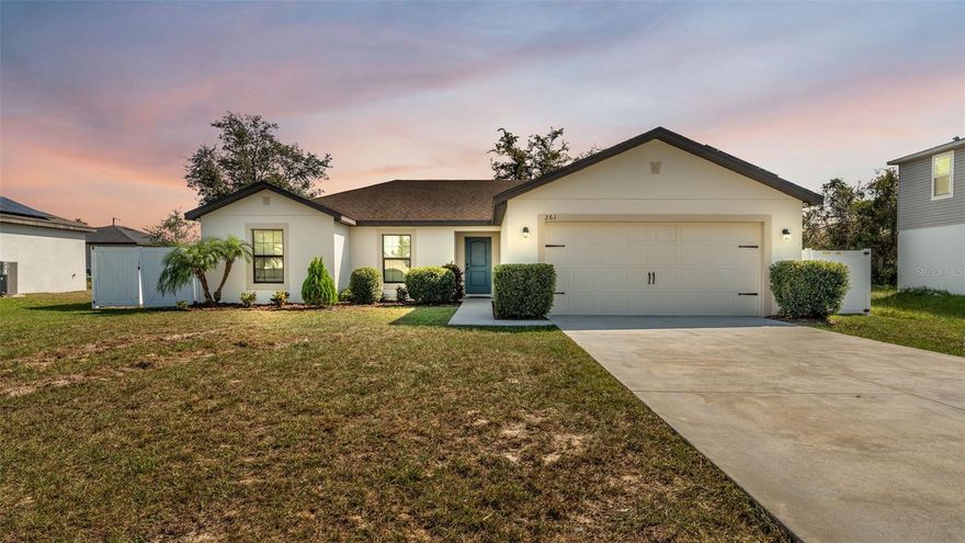 One or more photo(s) has been virtually staged. Welcome to this modern and beautifully maintained 4-bedroom, 2-bathroom home offering an open, airy layout and upgraded finishes throughout. Built in 2020, this 1,684 sq. ft. residence combines style, efficiency, and comfort—perfect for both everyday living and entertaining.  Step inside to a bright, open floor plan that seamlessly connects the living, dining, and kitchen areas. The updated kitchen features contemporary finishes and a layout designed for both cooking and gathering. Tile flooring in the main living areas pairs with luxury vinyl plank in multiple bedrooms, creating a clean, cohesive look that’s both durable and low-maintenance. Updated lighting, fixtures, and ceiling fans add a modern touch to every room.  The large master en suite offers a private retreat with ample space to unwind. An indoor laundry room enhances convenience, while the home’s thoughtful split-bedroom design adds privacy for family or guests.  Step outside to a fully fenced backyard—ideal for pets, play, and outdoor living—and enjoy the benefits of solar panels that help reduce monthly energy costs. The home is completed by an attached two-car garage and sits in a community convenient to local parks, shopping, schools, and major roadways.  This move-in-ready home offers the perfect blend of modern style, efficiency, and functionality. Don’t miss your chance to make it yours—schedule your private showing today!