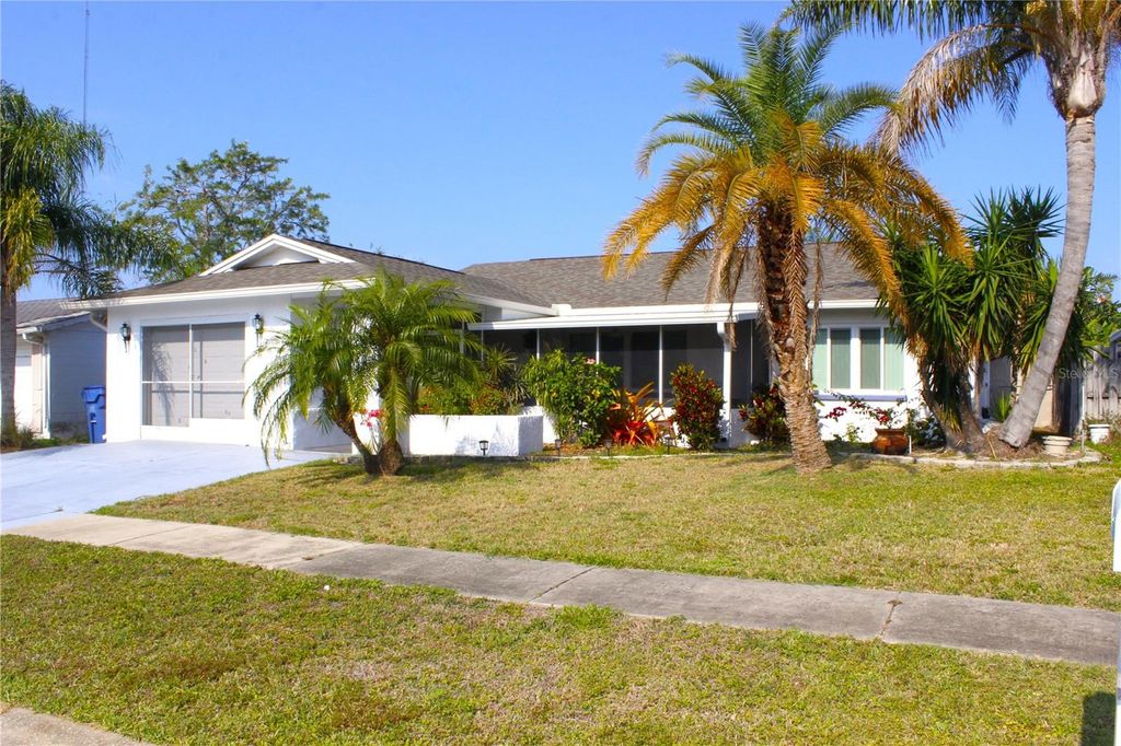 Photo of 2211 Harrison Drive, Holiday, FL 34691 (MLS # TB8471292)