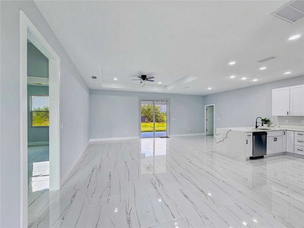 Photo of 3367 Meadow Road, Lehigh Acres, FL 33974 (MLS # C7499638)