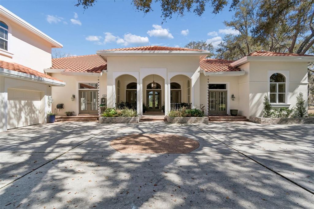 Photo of 5212 Golf Links Boulevard, Zephyrhills, FL 33541 (MLS # A4681585)