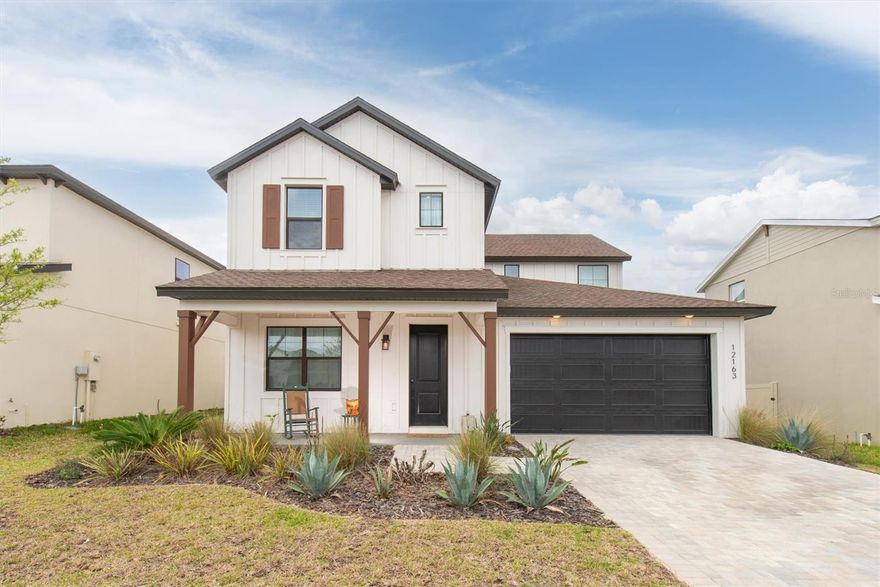 Welcome to this stunning 4 bedroom, 3 bathroom residence in the sought-after Hilltop Point community. A beautiful, open-concept home, boasting 2,711 square feet of stylish and functional living space, with a floorplan no longer available in this community! From the moment you walk in, you'll love the open layout with spacious living areas and brilliant quartz countertops that make the kitchen shine. The highly desirable floor plan offers a first floor bedroom and a full bath, providing the perfect setup for guests, a private home office, or a flexible living space. There is also a loft space for entertaining upstairs as well. All of the upstairs bedrooms have generous space with walk-in closets. Step outside to your fully fenced backyard, ideal for entertaining, relaxing, or just enjoying Florida evenings at home. The beautiful community of Hilltop Point features a community pool, dog park, community playground, and scenic walking trails with wide sidewalk paths throughout. All of this with NO CDD & a low HOA. Just minutes to Mirada Lagoon, shopping, stunning state parks, and quick access to I-75, making commuting a breeze. Ready to make this dream home yours? Schedule your private tour today!