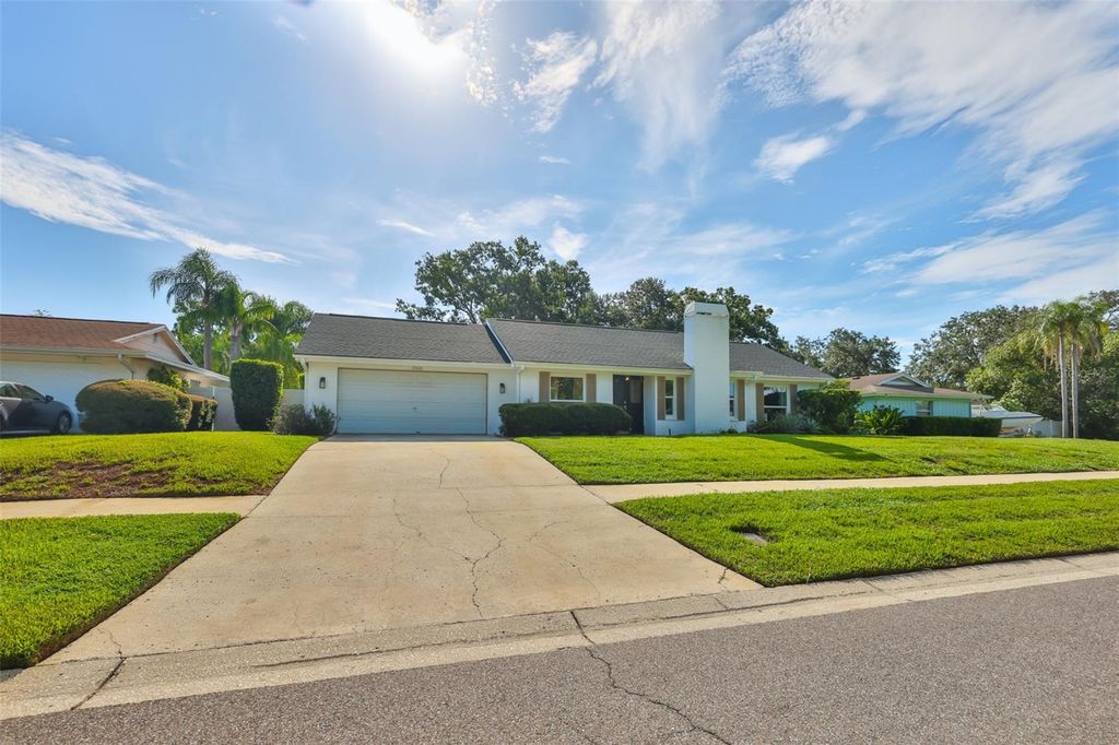 Photo of 13562 Lake Magdalene Drive, Tampa, FL 33613 (MLS # TB8418180)