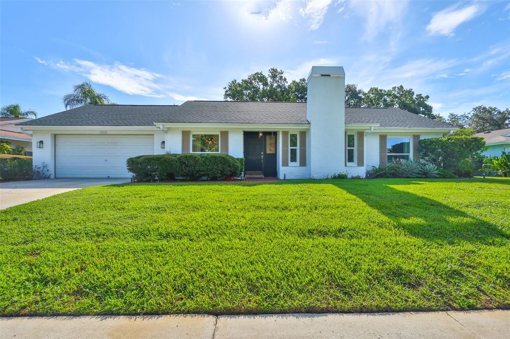 Photo of 13562 Lake Magdalene Drive, Tampa, FL 33613 (MLS # TB8418180)