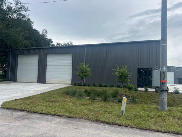 Well-positioned within Dade City limits, this property offers excellent visibility on a corner lot near the US-98 Bypass. The main warehouse features 4,440 sq. ft. of space, complemented by an additional 2,450 sq. ft. office/warehouse area. Property highlights include a roll-up door with direct access, concrete drives and pads, irrigation system, 3-phase power, and office space with A/C. With its strategic location, modern amenities, and versatile layout, this property is an excellent fit for businesses needing storage, distribution, light manufacturing, or a combination of office and warehouse use.
