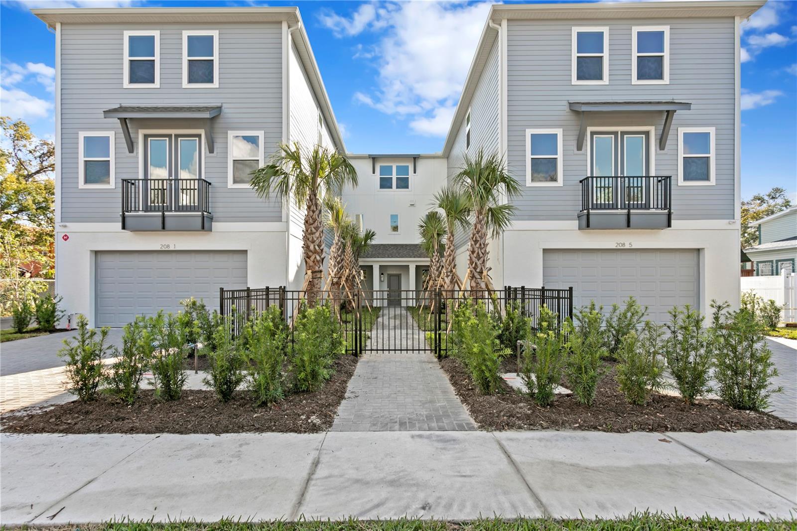 Fully completed new construction! Welcome to Frances Place, where luxury meets convenience in the golden quadrant of Tampa Heights. There is good reason to find peace of mind in this exquisite townhome community that sits 41 feet above sea level, reassuring you that your home is a safe haven from most any storm. No flooding issues on this street during the hurricane and no flood insurance required. As you approach Frances Place, you’ll be greeted by the Rosemary Beach design and a community courtyard that is a welcoming way to greet your guests. This three bedroom unit offers great flexibility with an added bonus room on the first floor to be used for office, media or playroom. On the second level you’ll be pleased to find wide open living spaces with generous ceiling height, an abundance of natural light and oversized hurricane rated windows. Elegant in design, the entire unit is finished with luxury vinyl flooring that is a breeze to maintain and goes well with any home décor. The finishes in the gourmet kitchen are complete with quartz counters, brass hardware on gleaming 42-inch white wood cabinetry, high end stainless appliances and plenty of storage space. The bathrooms are all finished in marble countertops, and fine decorator tile. On the private bedroom floor, you’ll find the primary bedroom and two guest rooms, two full baths and laundry room complete with a GE profile washer and dryer. Block separation walls between each residence ensure optimal sound insulation. You’ll enjoy the convenience of a two-car attached garage with epoxy floors, but you may find yourself spending more time walking the few blocks to Armature Works and Tampa’s Waterfront Riverwalk. Frances Place brings the perfect blend of elegance, sophistication, and modern functionality in a neighborhood you’ll love to call home.