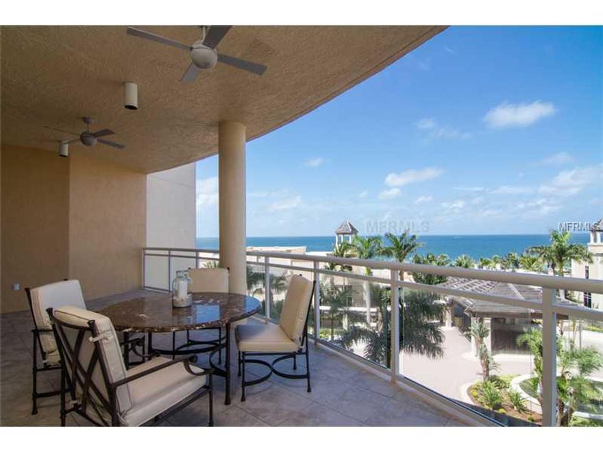 Exceptional opportunity to own this stunning 4 bedroom, 4 1/2 bath Beach Residence with expansive terraces and breathtaking views of the Gulf, the Bay and downtown Sarasota. In addition there is a large ensuite office that could be a 5th bedroom. The WOW factor begins the moment you step into your private foyer and continues throughout this gracious, light filled residence. This is the epitome of luxurious living at the beach! Only the finest materials were used and the superb craftsmanship and exquisite detailing are sure to delight the most discerning buyer. One entire wall in the living room is crafted of textured marble imported from Brazil and is beautifully complimented by marble floors with pale aqua glass tile inlays. You will enjoy the world class ammenities of the Ritz Carlton including private gated entrance, concierge services, resort style pool and spa, state-of-the-art fitness center, gracious social room, billiards room, elegant board room, spacious theater with tiered seating and 2 guest suites. It gets better, this home comes with 2 indoor parking spaces near the elevator and 2 household pets (dogs,cats,birds) are permitted. The exclusive Ritz Carlton Members Club can include beach, spa, tennis and golf.... the ultimate pleasure of priviledge.
