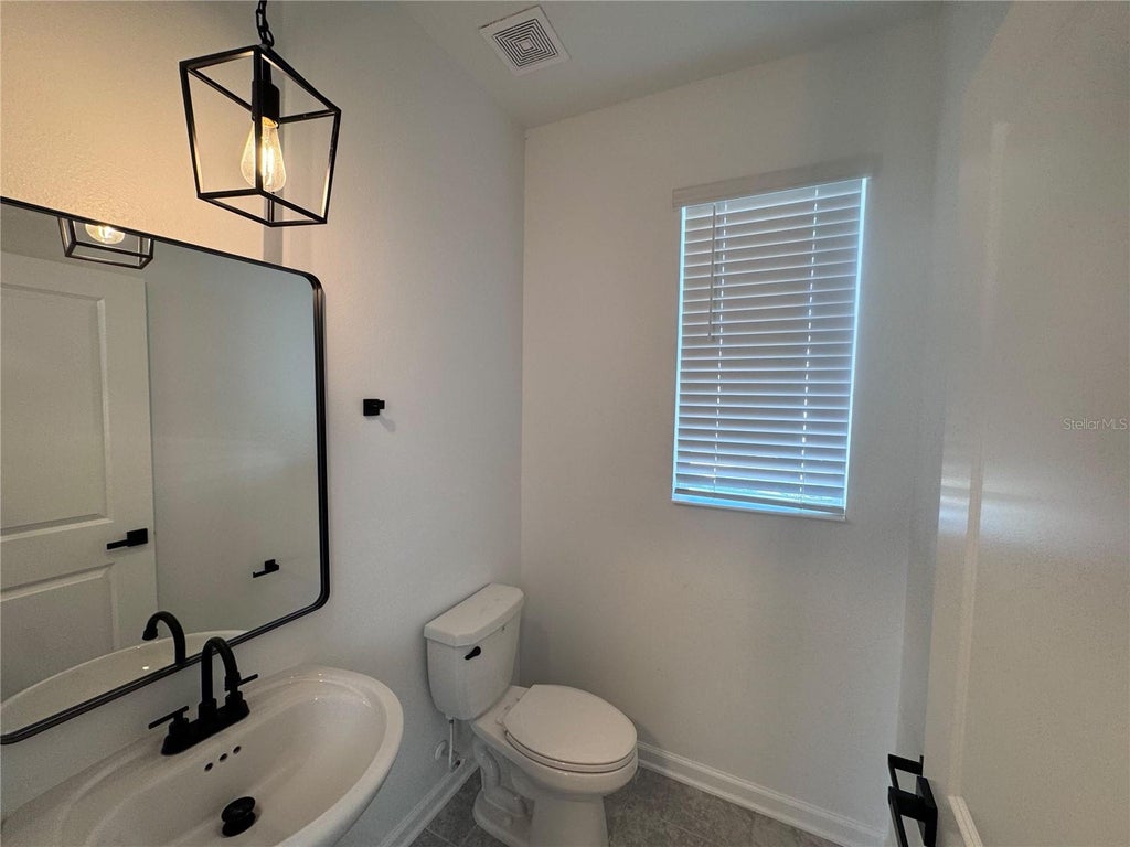 Photo of 156 Bogey Drive, Davenport, FL 33896 (MLS # S5160179)