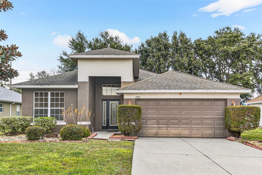 Welcome to 1754 Palmerston Circle. This three-bedroom, two-bathroom home offers a bright, functional layout with natural light throughout. The home features a flexible bonus room, a formal dining area, and open kitchen overlooking the main living space. The kitchen includes stainless steel appliances and opens to covered lanai and spacious backyard with mature trees. The primary bedroom features an en-suite bathroom with a soaking tub, standing shower, double vanity, and walk-in closet. Two additional well-sized bedrooms share a full bathroom. Additional feature include tile flooring throughout, fresh interior paint, and washer and dryer included for tenant convenience. Conveniently located AdventHealth Apopka, with easy access to the Florida Turnpike and SR-429, and close to major Orlando attractions including Walt Disney World and SeaWorld Orlando. Move-in ready and available now. Call today to schedule private showing.