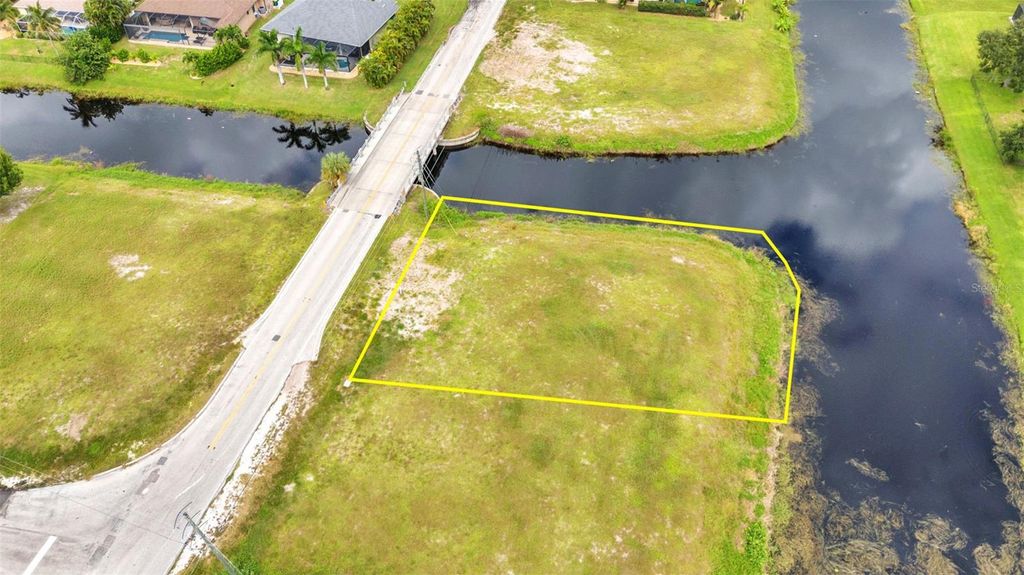 Photo of 893 Rotonda Circle, Rotonda West, FL 33947 (MLS # D6144015)