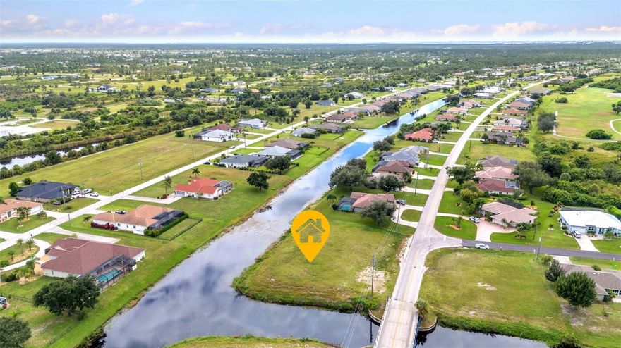 Rare corner lot on intersecting canal waterways for premium water views. This X FLOOD zone lot is prime location so no flood insurance needed with most mortgage lenders. NO CDD fees combined with PUBLIC WATER AND SEWER hookup availability make this the perfect spot for your new home. Rotonda West is a beautiful deed restricted community with low HOA fees (only $190 a year) that offers a community park with tennis / pickleball courts and also a community center with a doggie friendly walking path. Many new custom homes being built in the immediate area. There are 5 public easy play golf courses within the community of Rotonda for those who golf, the trailhead for the Pioneer Bike Trail is just 1 mile up the road for the bicyclist. Take your pick of the beautiful Gulf beaches on Manasota Key or Boca Grande Island that are just minutes away. A perfect peaceful location in paradise for your Florida dream home!