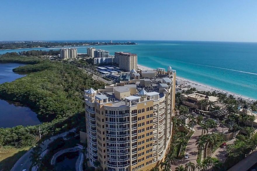 Experience the enchantment of hypnotic sunset vistas at "The Beach Residences," expertly managed by The Ritz-Carlton. This exquisite residence promises day-to-night fascination with its breathtaking Gulf views to the West and bay views to the East from the guest bedrooms and den. The majestic living area in this generously proportioned 3,861 sq. ft. home offer eleven foot ceilings which are unique to the 11th floor. The gourmet kitchen is complete with high-end appliances and luxurious finishes. The residence features beautiful hard-wood flooring throughout and is available furnished for immediate occupancy. Embrace the exclusive Ritz-Carlton lifestyle, complete with an unparalleled array of amenities, ensuring a life of seclusion and luxury. Here, you can indulge in a private pool and spa, a social room, a well-appointed kitchen, a boardroom for your business needs, and a billiards room as well for recreation. Movie enthusiasts can revel in the on-site theater with tiered seating, while those seeking relaxation can visit the massage room.
 
The attentive 24-hour concierge service ensures all your needs are met. Maintain your well-being at the state-of-the-art fitness center, and provide your guests with comfort in the available guest suites. Even your furry companions are catered to with a convenient dog run. The comprehensive maintenance fee covers an array of services including building exterior maintenance, cable and internet, escrow reserve funds, flood insurance, ground upkeep, building insurance, maintenance and repairs, managerial services, public insurance, recreational facilities, roof maintenance, security, trash removal, and water and sewer expenses. At "The Beach Residences," pets are not only welcome but celebrated, with no weight limit imposed. Plus, you're only moments away from the vibrant St. Armands Circle and the rich cultural offerings of downtown Sarasota. This residence is not just a home; it's a gateway to an opulent coastal lifestyle.