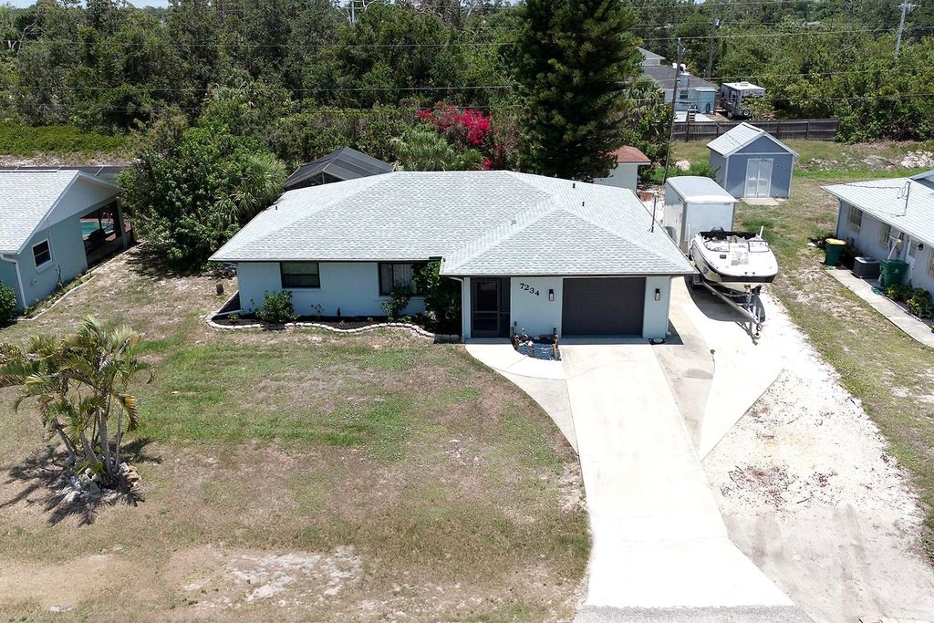 Photo of 7234 Mamouth Street, Englewood, FL 34224 (MLS # D6142338)