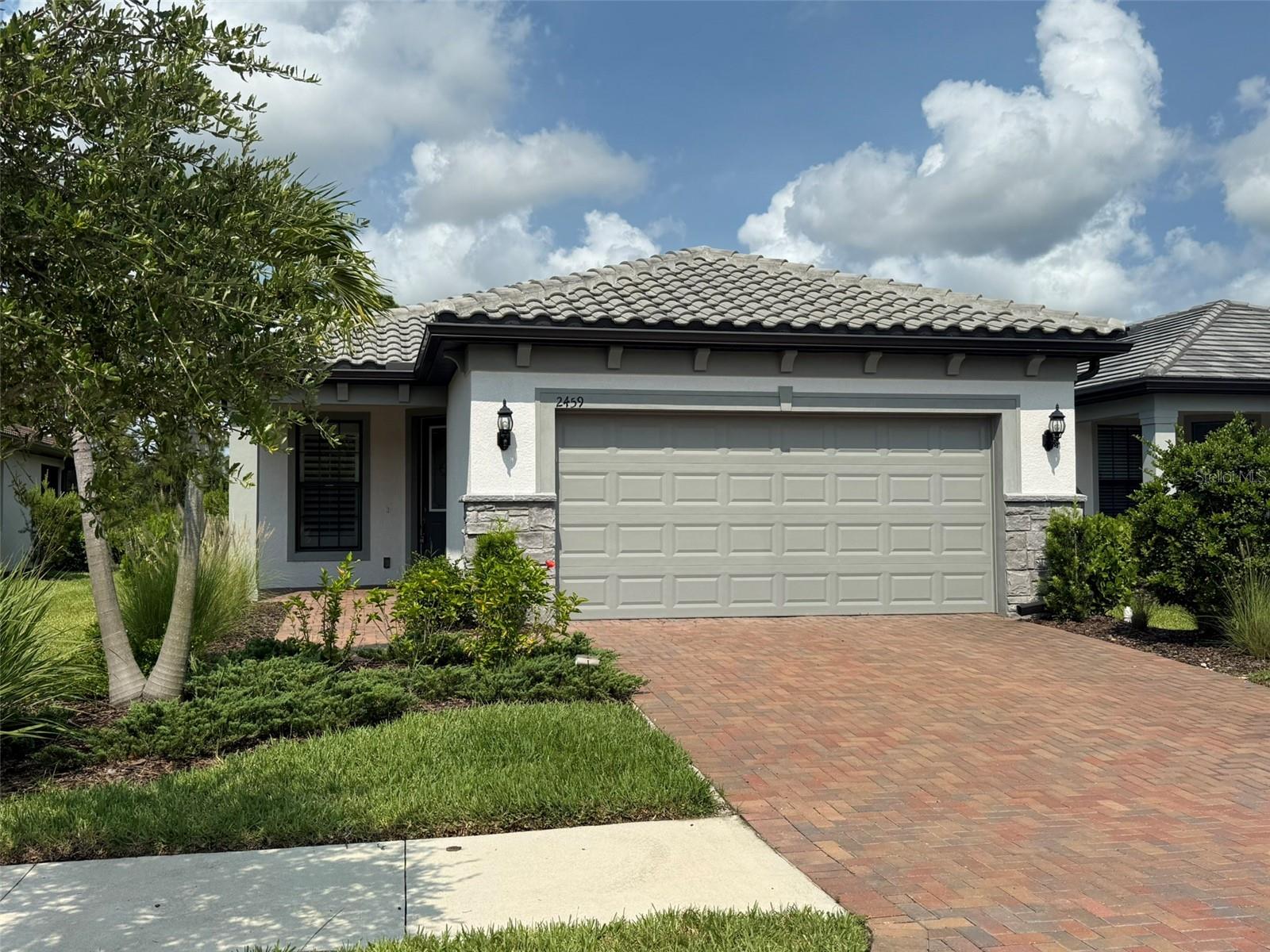 Better Than New! Take a good look at this stunning landscape maintenance-free home located in one of Florida Gulf Coast's premier 55+ gated communities! Property may qualify for a Lender/Seller Paid Mortgage Interest Rate Reduction Credit when using an approved participating lender- available at closing, buyer qualifications and lender guidelines and restrictions may apply* (see below)!
Your dream retreat awaits you at the highly sought-after Cypress Falls at the Woodlands - a vibrant Del Webb 55+ community in North Port, on Florida's west coast! Built in 2022 and impeccably maintained, this 2-bedroom + den, 2-bath home offers the perfect blend of modern elegance and relaxed Florida living — placed on an upgraded premium lot with serene pond and preserve views!
Step inside and be greeted by an amazing open-concept floor plan with plantation shutters and sunshades throughout the home, 8’ doors, and 18” tile flooring, sunshades on the huge oversized lanai spanning the full width of the home overlooking both pond and preserve! The gourmet kitchen is a chef’s dream, featuring lovely quartz countertops, upgraded cabinetry, a large island, and seamless open flow into the dining and living areas — perfect for entertaining!
The split-bedroom layout offers privacy, with a luxurious primary suite boasting Closets By Design custom walk-ins, a spa-like en-suite bath, and peaceful views of nature. A beautifully appointed spacious guest bedroom and bathroom with an upgraded inside laundry room completes the floorplan, complimented by a den/office with double doors - perfect, bright, airy - an ideal space for work or hobbies.
Enjoy indoor-outdoor living with a spectacular, extended screened lanai encompassing the full-width of the home, and equipped with roll-down sunshades and ceiling fans! The perfect place to relax and experience breathtaking sunsets over the pond and nature preserve!
Additional upgrades include:
* Plantation shutters and sunshades throughout the home
* Closets by Design in the master, guest room, and pantry
* Upgraded trim package
* Laundry room enhancements
* Oversized 2-car garage with epoxy floors, utility sink, built-in Closet by Design organizers, and hurricane panel storage
All of this in a low-maintenance lifestyle community offering: Two Resort-Style Pools, Fitness Center, Tennis & Pickleball Courts, Bocce, Walking Trails, Clubhouse with Full-Time Lifestyle Director, and Year-Round Events, Clubs & Activities! The perfect community to easily make friends, connect with neighbors and foster new relationships! Don’t miss the opportunity to live your best life in this move-in ready, better-than-new home that blends elegance, function, and Florida charm.
Located with easy access to shopping, dining, parks, golf, entertainment, and of course the Gulf Beaches! This community offers a perfect balance of peace and tranquility with an active adult lifestyle! Schedule your private showing today and come see why Cypress Falls is the lifestyle you've been waiting for! Make it yours, before someone else does! *Financing incentive may be available for primary residence purchases with buyer and lender qualifications/restrictions. Financing incentive subject to lender loan approval & may change without notice. Not a commitment to lend. Additional restrictions may apply. Let's talk! Start enjoying the amazing amenities and social life at Cypress Falls in North Port, FL today!