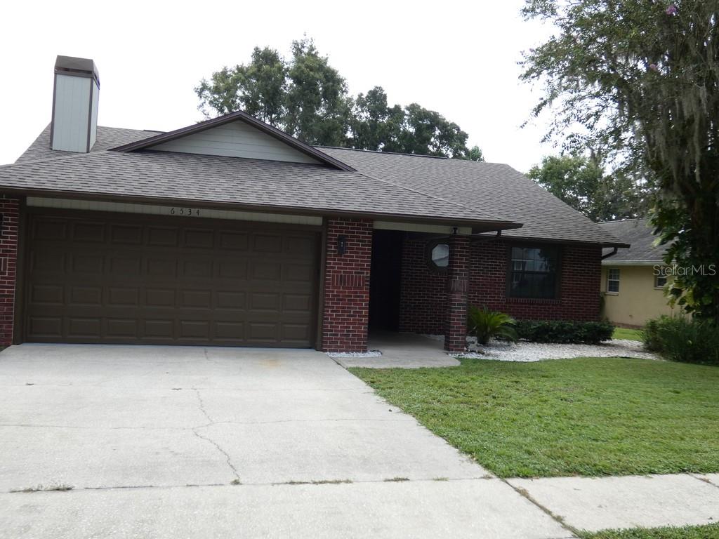 Welcome to this beautifully maintained 3-bedroom, 2-bathroom, 2 Car Garage, Block & Brick home offering 1925 square feet of living space in the desirable Silver Oaks Community. The County says this is a non Flood Zone, (X) This residence is designed for both comfort and function with 12 Foot Vaulted Ceilings, a cozy wood-burning fireplace, and an enclosed Florida room that provides flexible year-round living. The spacious master suite includes dual walk-in closets and a spa-inspired bathroom. Throughout the home, thoughtful updates create a move-in ready experience. A full roof replacement was completed in 2024 with warranty coverage, and the HVAC system, installed in 2015, carries warranty protection through 2027. Energy Star appliances were added in 2023, and in 2025 the kitchen was beautifully remodeled with new cabinets, quartzite countertops, and a new sink. Both bathrooms were fully renovated in 2023, and the home features new flooring, fresh interior and exterior paint, and a smart thermostat with RedLINK Gateway installed in 2025.The garage has been refreshed with epoxy flooring, a new laundry sink, and direct access to the Florida room, which also received epoxy flooring for a clean, modern look. Exterior improvements include new landscaping, a sprinkler system repair with new components in 2025, and marble gravel at the entryway, enhancing curb appeal. Silver Oaks residents enjoy the benefit of a low HOA, less than 72.00 a month with no CDD fees, power lines below ground, while also being close to shopping, dining, medical centers, the YMCA, and the Silverado Golf Course. This home is less than 45 minutes from St. Pete Beach, recently named the number one beach in the U.S. and the fifth best beach in the world. With the option for sellers to remove all furniture and personal belongings after closing, this property is truly turnkey and ready for its new owners. Visitors are kindly asked to remove their shoes during showings. Less than 45 minutes to St. Pete Beach In Florida was just named The #1 Beach in America and the Fifth Best Beach in The World. Please view two videos: Tour 1 & Tour 2