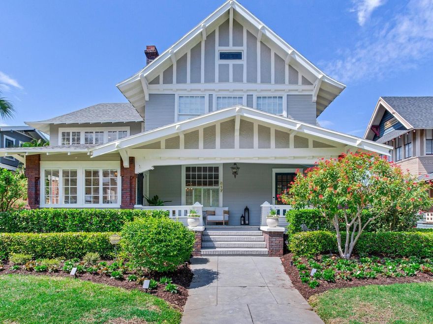 Perfectly situated 3 blocks from Bayshore Blvd and Hyde Park Village and not in a flood zone, the residence at 817 S Willow Ave. is one of the most uniquely beautiful and functional historic homes  in Hyde Park. Its 1925 architecture & finishes represent a mixture of exterior influences from half -timbered homes in Northern France & interior influences from 1910-1930 American Craftsman detailing. Some noted exterior features are the use of natural elements: wood, brick & mortar, brick columns & piers, a porte-cochere, a low sloping front roof, a broad front porch with a front stoop & a bead board ceiling, graceful wood framed glass doors, numerous casement windows, & ornamental wood trim. The inviting front landscaping neatly frames this newly painted mindful gray & simply white trimmed home.  The wide, welcoming front porch is where you will watch & meet your neighbors as they stroll by. Other Craftsman features include a large living room with a wood & tile fireplace surround, a spacious dining room with built in shelving & plate rails, a butler’s pantry with wood trimmed glass display cabinets, & a sunroom. The kitchen includes a built-out center island (with beverage drawers, wine racking, cabinets, and a prep sink), an eating bar, top grade appliances, solid wood & glass display cabinets, & a built-in desk. The kitchen & dining bar open to the ample family room/ informal dining area. A walk-in pantry & separate utility room are nearby. From the screened back porch enjoy afternoon tea & the inviting pool, its handsome decking, sun shelf, patio, outdoor shower, & newly landscaped backyard. Also, there is an oversized 2-car garage with attic storage & ample parking in the driveway.  An eye-catching double entry double staircase with casement windows at its back wall creates a beautiful architectural element seen upon entering the home. The 2nd floor landing branches out to the 4 bedrooms. First is the primary bedroom that includes a lounge/library area, a balcony, his & her walk-in closets, & the primary bath with tub, large walk-in shower, pedestal sinks & a make-up niche. There are 3 other bedrooms (all wonderfully appointed) & 1 shared bathroom. Note, architectural plans are available to show how easily a 3rd bath may be added. Lastly, the 3rd floor is that extra space you always wish you could have. Currently, areas of the room include TV viewing, a game table, a computer station, & more. With  this home comes reassurance that support piers & a porte-cochere column have been renovated and certified and plumbing under the house has been replaced. Many other substantial upgrades have been made. For a detailed list, see the attached factsheet. Better yet, call today for a home tour. Bedroom Closet Type: Walk-in Closet (Primary Bedroom).