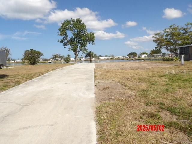 THIS MIGHT BE THE NICEST LAKEFRONT LOT FOR SALE IN LEMON BAY ISLES.
THE LOT ONCE HAD A MANUFACTURED HOME ON IT THAT WAS REMOVED AND CLEARED.
SELLER'S ARE STILL PAYING THE ENGLEWOOD WATER DISTRICT'S MONTHLY BILL SO THE NEW OWNER WILL NOT HAVE TO REPAY THE IMPACT FEE OF $14,900.
ENJOY THE WATER VIEW FROM YOUR PRIVATE DOCK.
THE EDGEWATER CLUBHOUSE HAS A POOL, PICKEBOARD, TENNIS, SHUFFLEBOARD AND OTHER OUTDOOR FUN.
THE CLUBHOUSE ACTIVITES WILL INTRODUCE YOU TO YOUR NEIGHBORS AND ENJOY OUR QUAINT COMMUNITY.
THERE ARE DINNER DANCES, POT LUCKS, LIVE MUSIC, MOVIE NIGHTS, CARD GROUPS AND MUCH MORE.
THERE IS A $1000. BUY IN FEE AND THEN JUST $300 ANNUALLY.
YOU OWN YOUR LAND BY FEE-SIMPLE. PET FRIENDLY. GOLF CARTS ARE WELCOME.
SOLD-AS-IS, SUBJECT TO BUYER'S APPROVAL.
ALL INFORMATION IS DEEMED RELIABLE, BUT BUYER/BUYER'S AGENT SHOULD VERIFY.