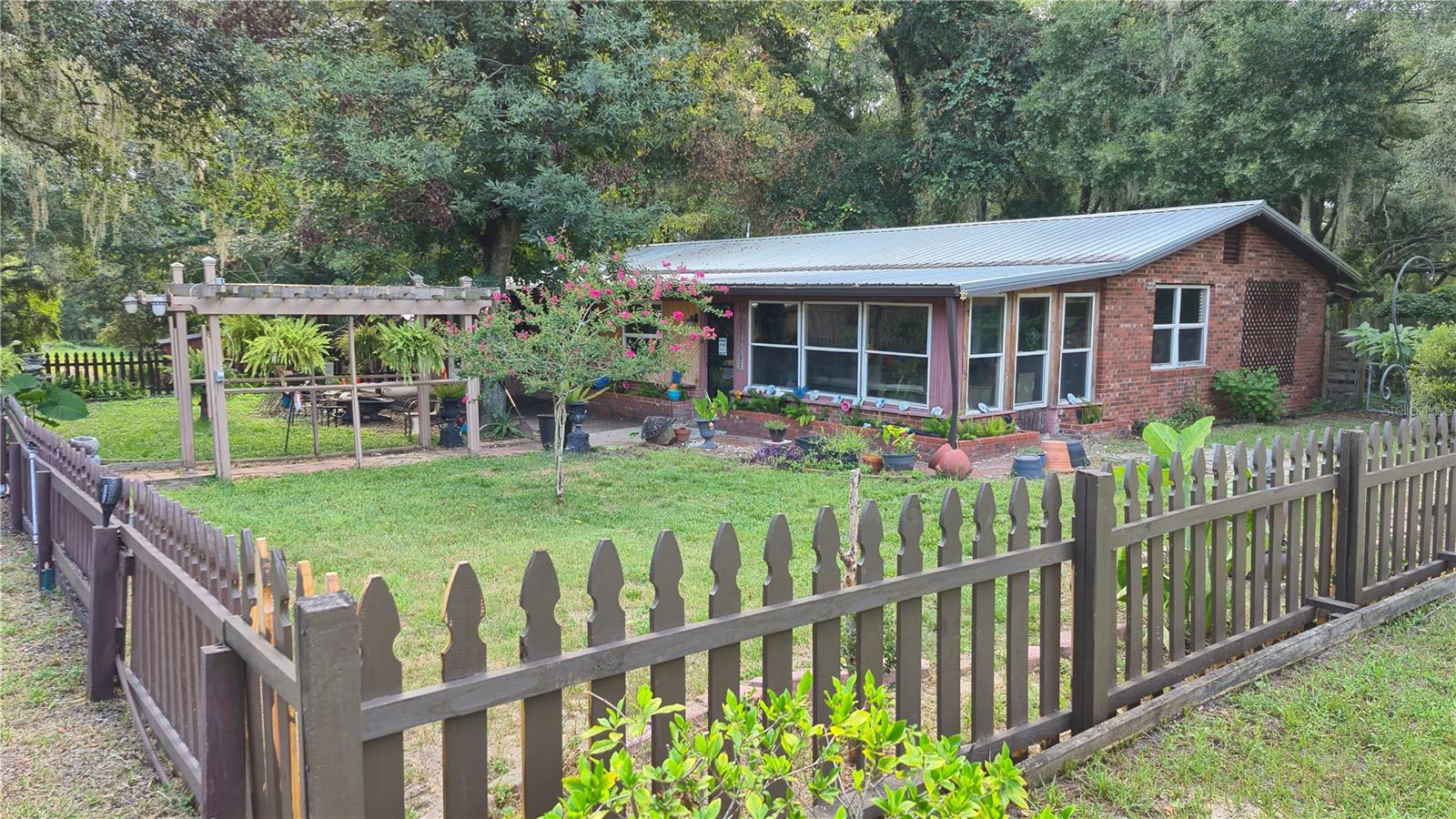 Charming Home on 3 Acres with Private Lake, Barn and Huge Potential. Country Charm meets opportunity! Bring your vision to this one of a kind property set on three beautiful aces with a serene private lake. This home offers endless potential, featuring a spacious kitchen, complete with a center island.
The metal roof provides durability, while the large barn adds versatility - perfect for storage, hobbies, or livestock. While the home needs some TLC, its peaceful setting and functional layout make it a fantastic investment or forever home project.
Enjoy country living with the tranquility of water views, open space, and room to grow.
