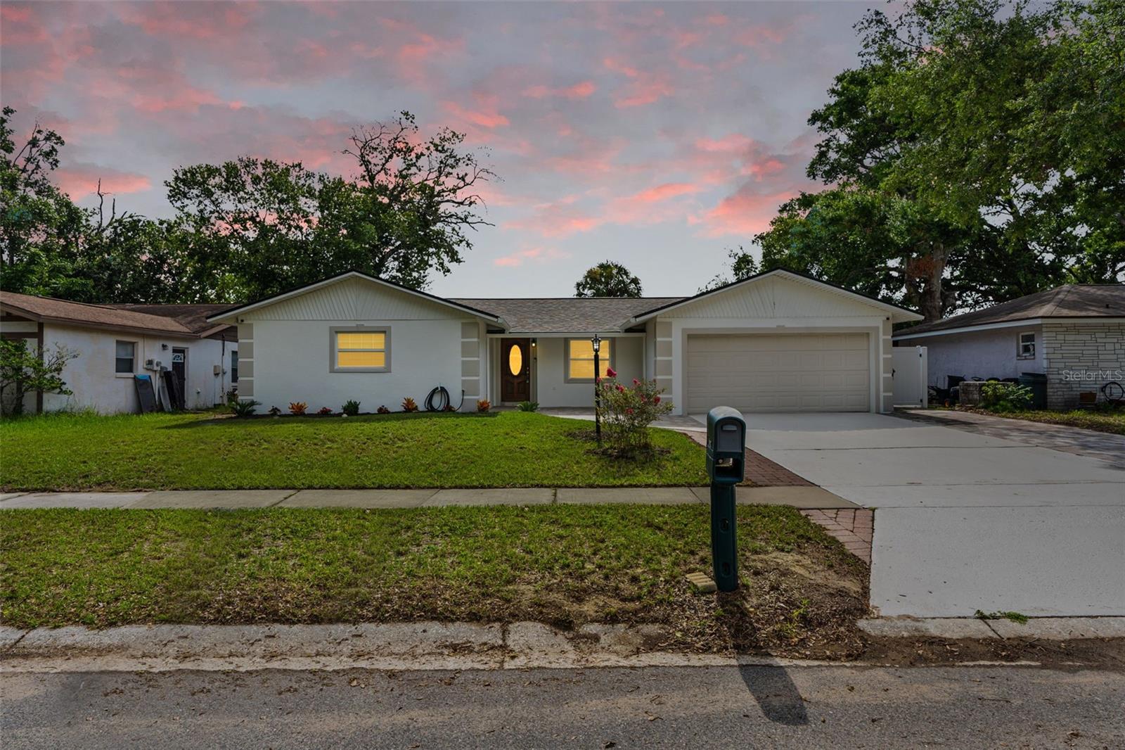 Nestled in a hot neighborhood just minutes from Brandon Mall and with effortless highway access, this move in ready gem features a 2021 roof & HVAC, fresh paint inside and out, brand new cabinets, doors & appliances, plus bespoke ceiling and light accents. Paver patios wrap the exterior and a lush, new front garden welcomes you home. There's even a versatile bonus space off the garage brimming with possibilities ask me how you could make it your own! Reach out now to book your private showing before it's gone.