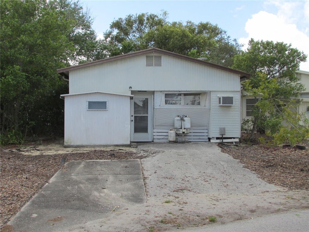 Photo of 13 Saddlebag Trail S, Lake Wales, FL 33898 (MLS # K4903392)