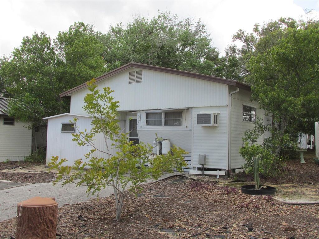 Photo of 13 Saddlebag Trail S, Lake Wales, FL 33898 (MLS # K4903392)