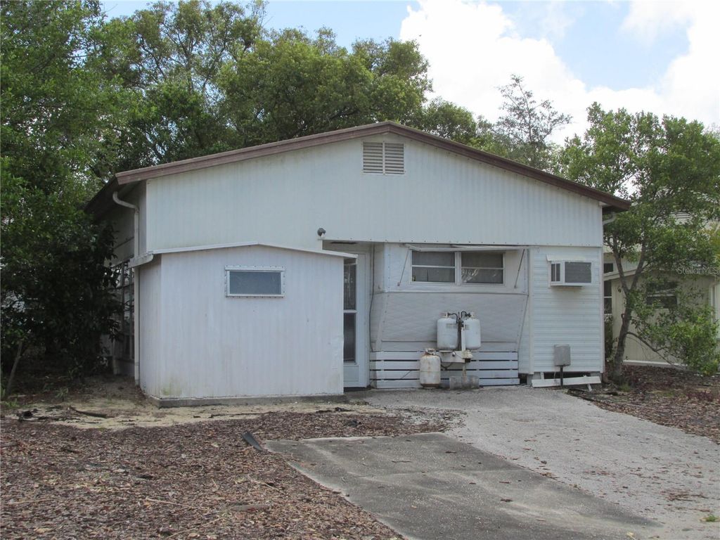 Photo of 13 Saddlebag Trail S, Lake Wales, FL 33898 (MLS # K4903392)