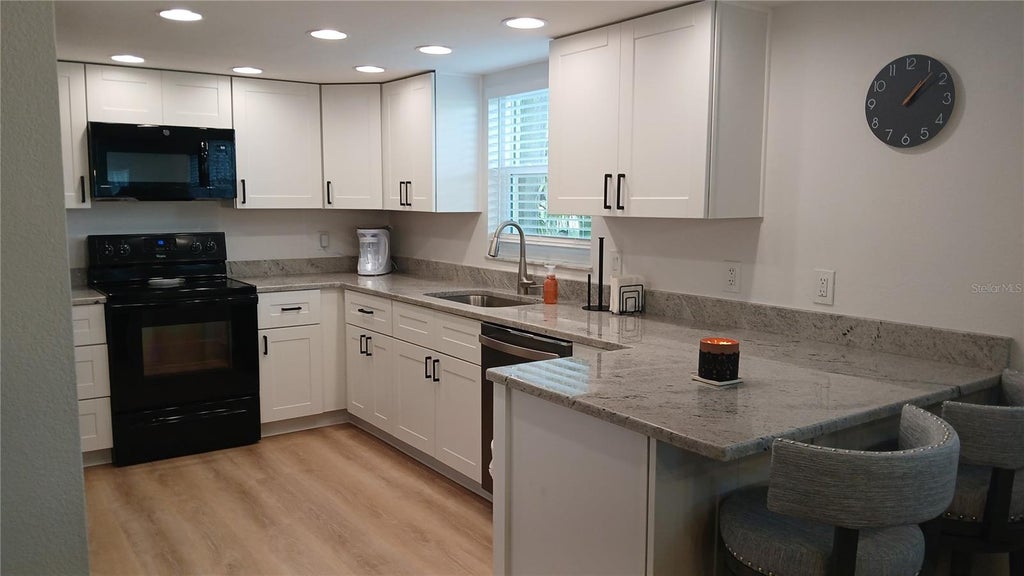 Photo of 12300 Park Boulevard #101, Seminole, FL 33772 (MLS # TB8541461)