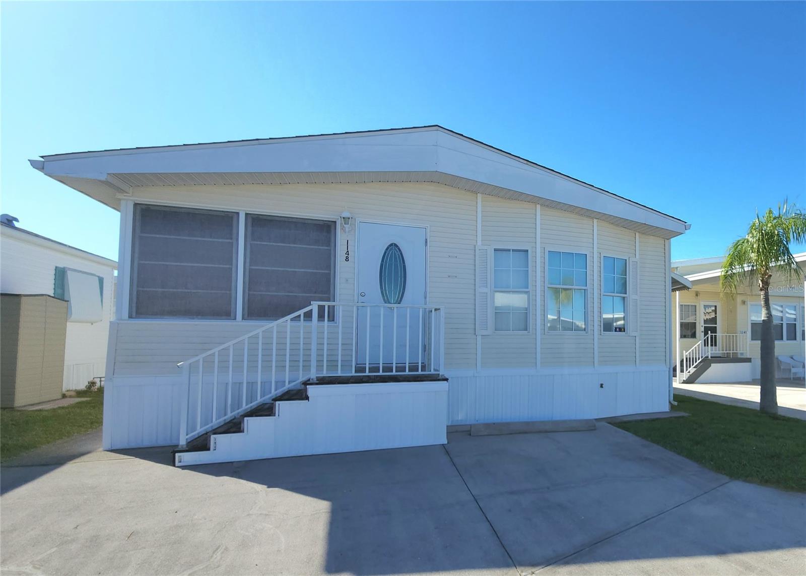 1996 MOBILE HOME IN ACTIVE 55+ COMMUNITY. FURNISHED one bedroom, 1 1/2 bath home which features a bright, enclosed front porch, spacious dining room, & laundry room with large storage closet. The primary bathroom has a tub/shower and huge linen closet. All appliances included. Central A/C (2014). Why spend another winter in the cold? This Florida home is just waiting for you! NO LOT RENT! The community of Sugar Creek Country Club features two swimming pools, heated spa, tennis & pickleball, shuffleboard, fitness room, club house, workshop, and an active social calendar during the winter months. LOW HOA FEES of just $525 quarterly which includes water, trash, sewer, basic cable, internet, and grass mowing. Enjoy this community's proximity to the Braden River and River Links Golf Course. Sorry this is not a dog lot.
